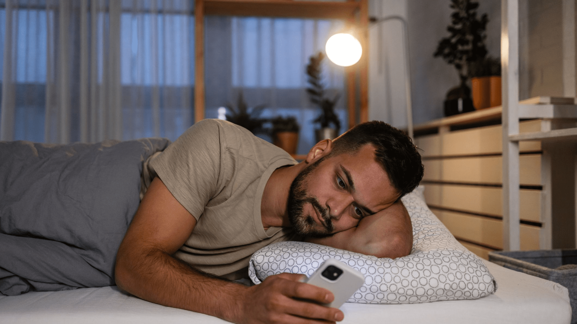 man texting Tempted to Text Your Ex? Here's Some Advice from Relationship Experts