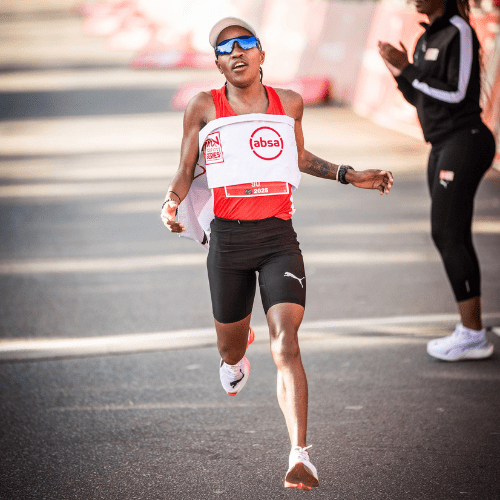  Elite Women’s Winner, Glenrose Xaba in action on route at the Absa RUN YOUR CITY TSHWANE 10K on Sunday 24 August 2025. PHOTO CREDIT: Tyrone Winfield