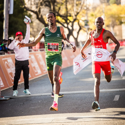 Aklilu Asfaw and Kabelo Mulaudzi sprint to the finish with Mulaudzi claiming gold at the Absa RUN YOUR CITY TSHWANE 10K on Sunday 24 August 2025. PHOTO CREDIT: Tobias