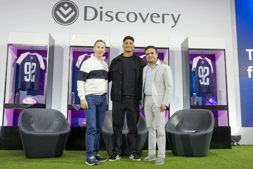 Hylton Kallner, CEO of Discovery South Africa and Discovery Bank; Sacha Feinberg-Mngomezulu, Springbok rugby player; and Firoze Bhorat, Chief Marketing Officer at Discovery.
