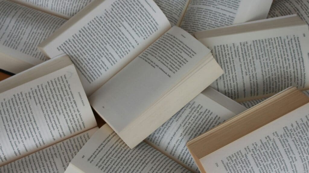 pile of open books